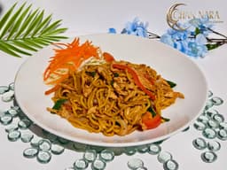 Lo Mein Drunken spicy stir fry with Chinese egg lo mein noodles, Thai basil, onions, and bell peppers
