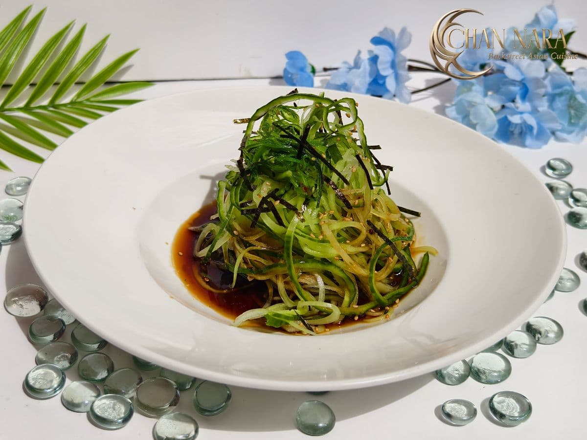 Cucumber Spiral Salad with spiralized cucumber, shredded daikon, seaweed salad, ponzu, and soy mustard dressings