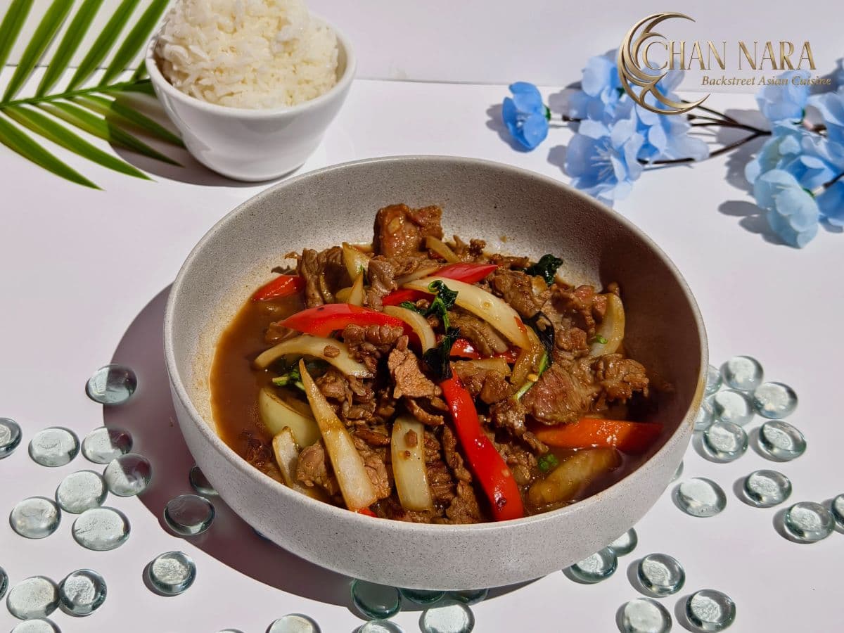 Ka Pow classic Thai dish with Thai basil, spicy chilis, garlic, and herbs