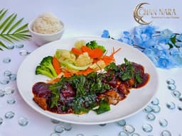 Crispy Duck marinated, steamed, deboned and fried, served with fried Thai basil and sweet dipping sauce