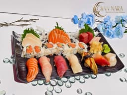 Sushi & Sashimi Regular spicy tuna roll with seven pieces sushi and seven pieces sashimi